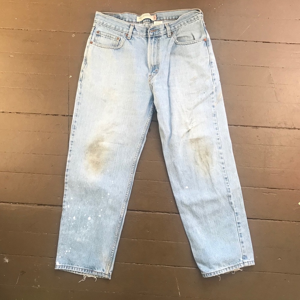 Vintage distressed Levis 550 relax fit blue jeans